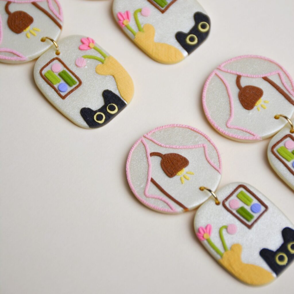 Boucles d&rsquo;oreilles – À la fenêtre